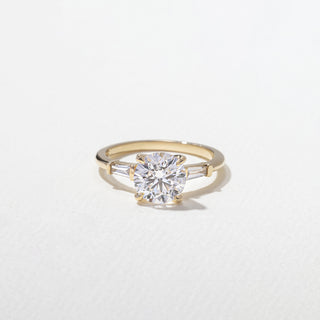round ring, moissanite round ring, round diamond ring, Best three stone engagement rings for women, Affordable three stone engagement rings online, Unique three stone engagement rings for her 
