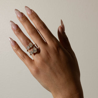 pear engagement ring, pear diamond ring, sweeping wave ring, toi et moi ring, engagement ring 