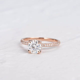 round-cut-solitaire-pave-moissanite-engagement-ring