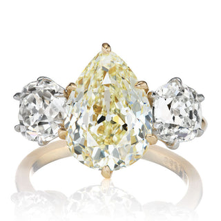 4.5 carat moissanite engagement ring
pear old mine moissanite ring
three stone moissanite ring
yellow moissanite engagement ring