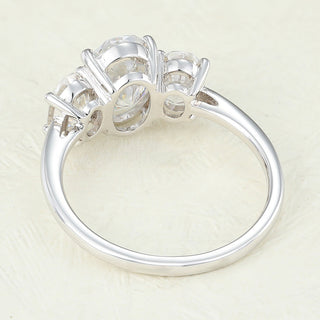 oval-shaped-moissanite-three-stone-engagement-ring