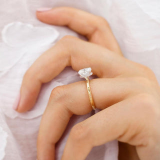 elongated-cushion-shaped-moissanite-hidden-halo-style-engagement-ring