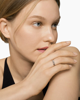 0.06 TCW Vintage Round Twisted X Moissanite Diamond Wedding Band