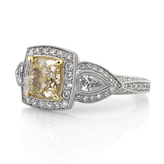 yellow cushion moissanite ring