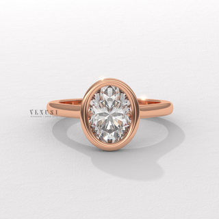 bezel set oval engagement ring