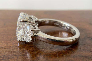round diamond engagement ring
engagement ring 
three stone ring 