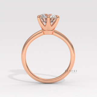 dainty solitaire engagement ring

