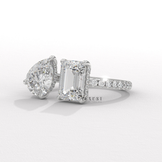 dual stone engagement ring emerald pear