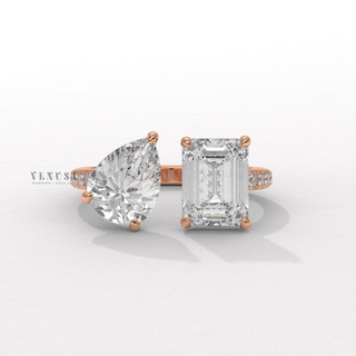 emerald and pear diamond engagement ring