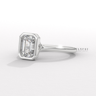 emerald bezel ring rose gold