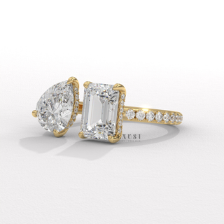 emerald cut and pear cut diamond ring