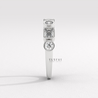 emerald and round bezel engagement ring
emerald cut bezel engagement ring
round bezel diamond ring
bezel set engagement ring
emerald and round diamond ring