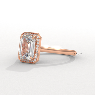 diamond halo engagement ring
luxury diamond ring
emerald cut solitaire ring
