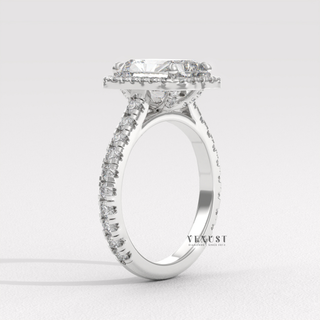 emerald halo moissanite ring