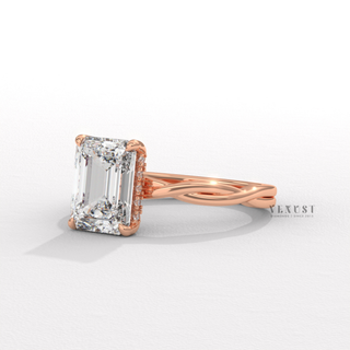 emerald infinity style engagement ring