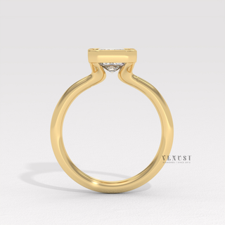 engagement ring emerald bezel
