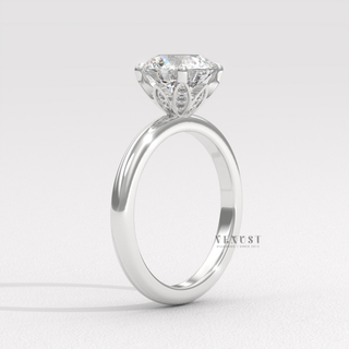 floral inspired round solitaire engagement ring
