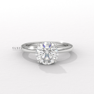 floral prong solitaire diamond ring