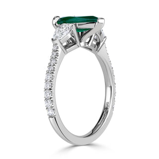 green gemstone engagement ring