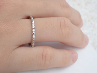 0.08 TCW Round Cut Unique Flush Moissanite Diamond Wedding Band