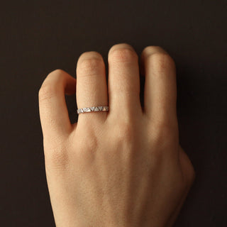 0-18ct-round-alternating-triangle-moissanite-diamond-wedding-band-in-solid-gold