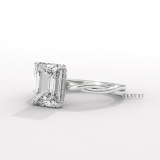 infinity twist emerald cut ring