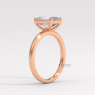 minimalist emerald cut diamond ring