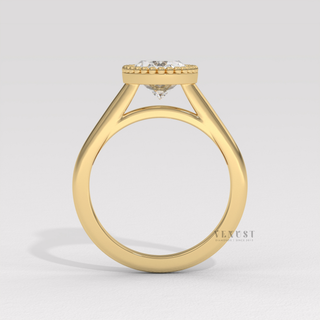 oval bezel yellow gold ring
