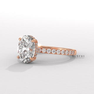 oval cut diamond ring with pave setting