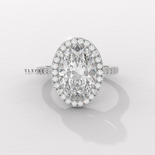 oval halo moissanite ring