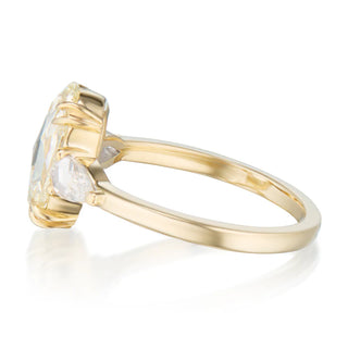 oval trilogy engagement ring
