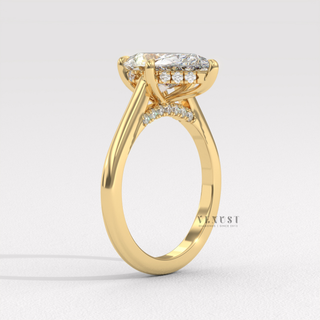 pear engagement ring cathedral setting hidden halo