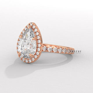 pear halo diamond ring