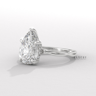 pear infinity setting engagement ring