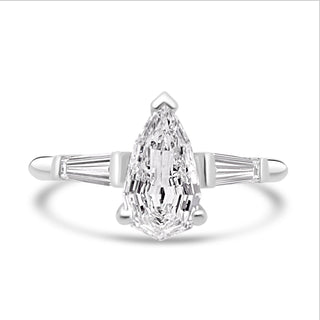 pear three stone engagement ring