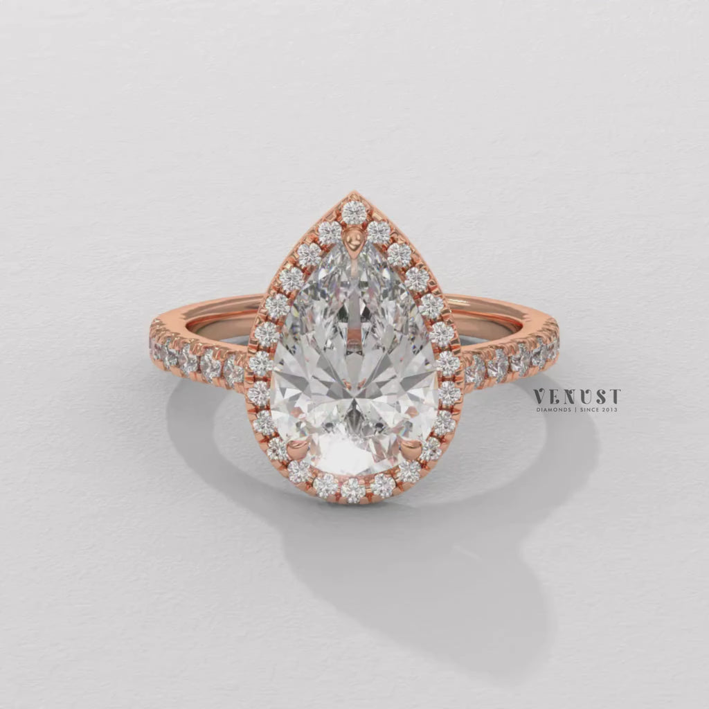 pear halo engagement ring