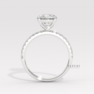 round cut hidden halo pavé engagement ring
