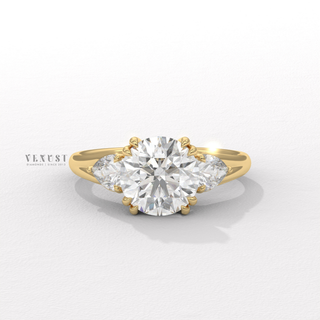 round cut three stone ring