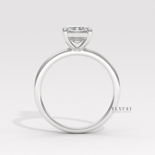 solitaire emerald cut ring