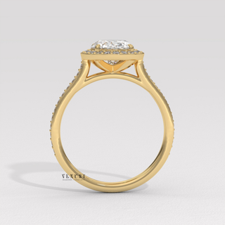 oval diamond with halo setting,  yellow gold diamond ring