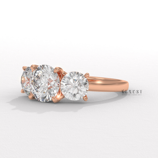 pear accent diamond ring
three stone ring 