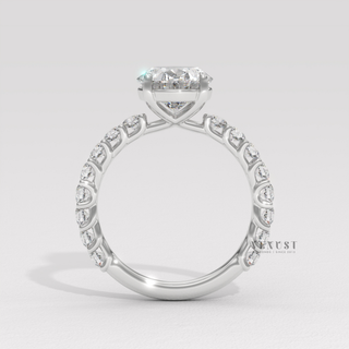 thin pavé band oval engagement ring