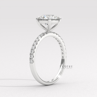 thin pavé band round engagement ring