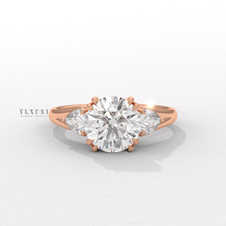 three stone engagement ring
three stone ring 
side stone ring 
round three stone ring 
round ring 
round engagement ring 