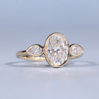 1.50CT Bezel Set Oval Moissanite Diamond Three Stone Engagement Rings