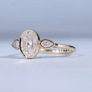 1.50CT Bezel Set Oval Moissanite Diamond Three Stone Engagement Rings