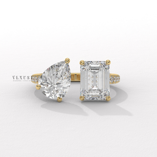 toi et moi engagement ring emerald and pear