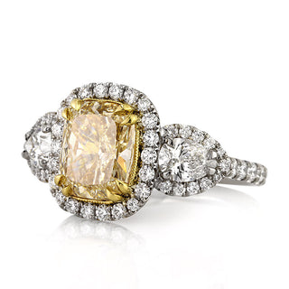 yellow cushion moissanite ring