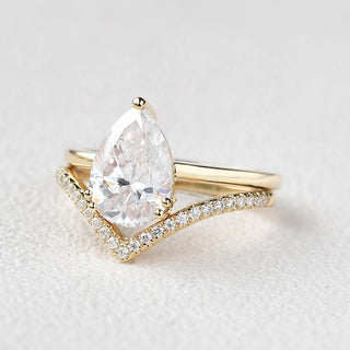 1.95tcw Pear Solitaire Moissanite Engagement Ring with Curved Wedding Band